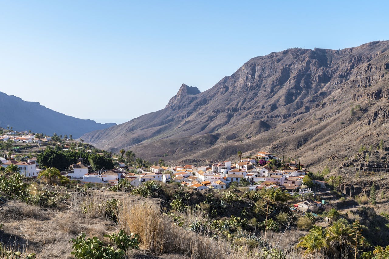 Explore the picturesque village nestled in the valleys of Gran Canaria, surrounded by striking rocky landscapes.